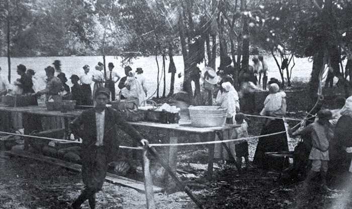 Cleaning up after the First Picnic.